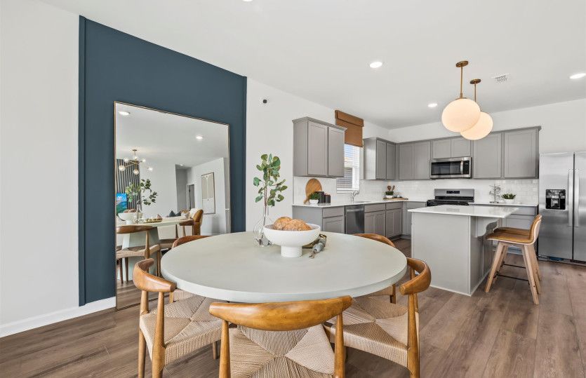 Enjoy meals in the Café area that opens to the Kitchen and Gathering Room.
