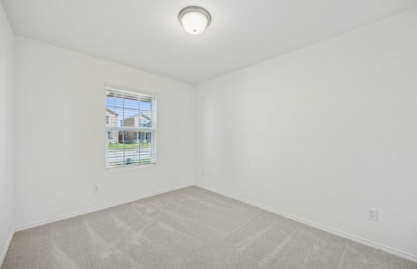 Spacious secondary bedroom*model representation