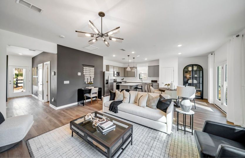 Experience the inviting warmth and conviviality of the gathering room in the Oriole at Grand Arbor.