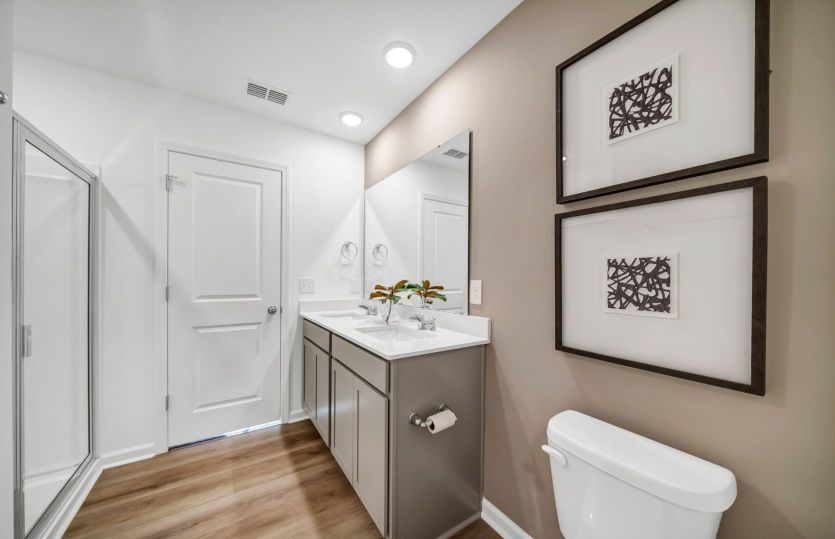 Owner's Bath with a large walk-in closet.