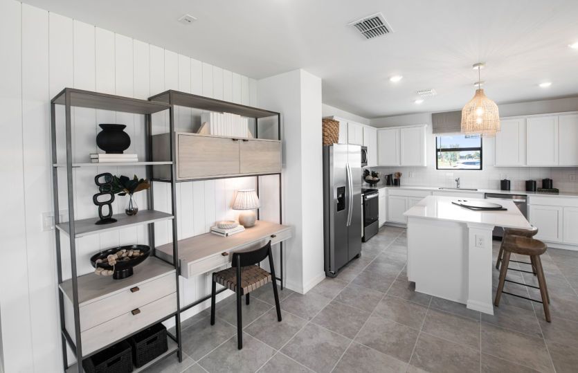 Gathering room in this 2-story home design