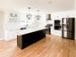 casa en Champion Builders, Inc. por Champion Builders, Inc.