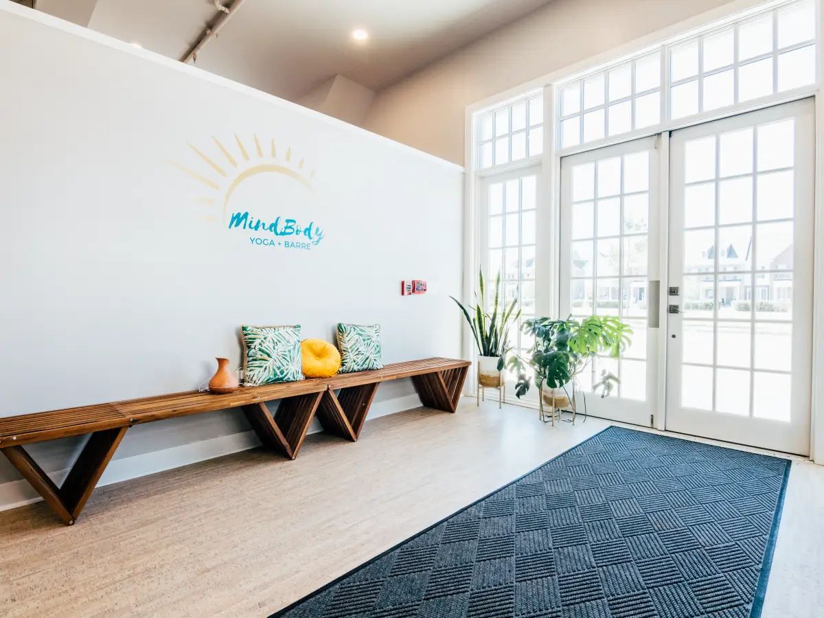 Join MindBody Yoga + Barre in studio or for an outdoor class on Hastings Green.