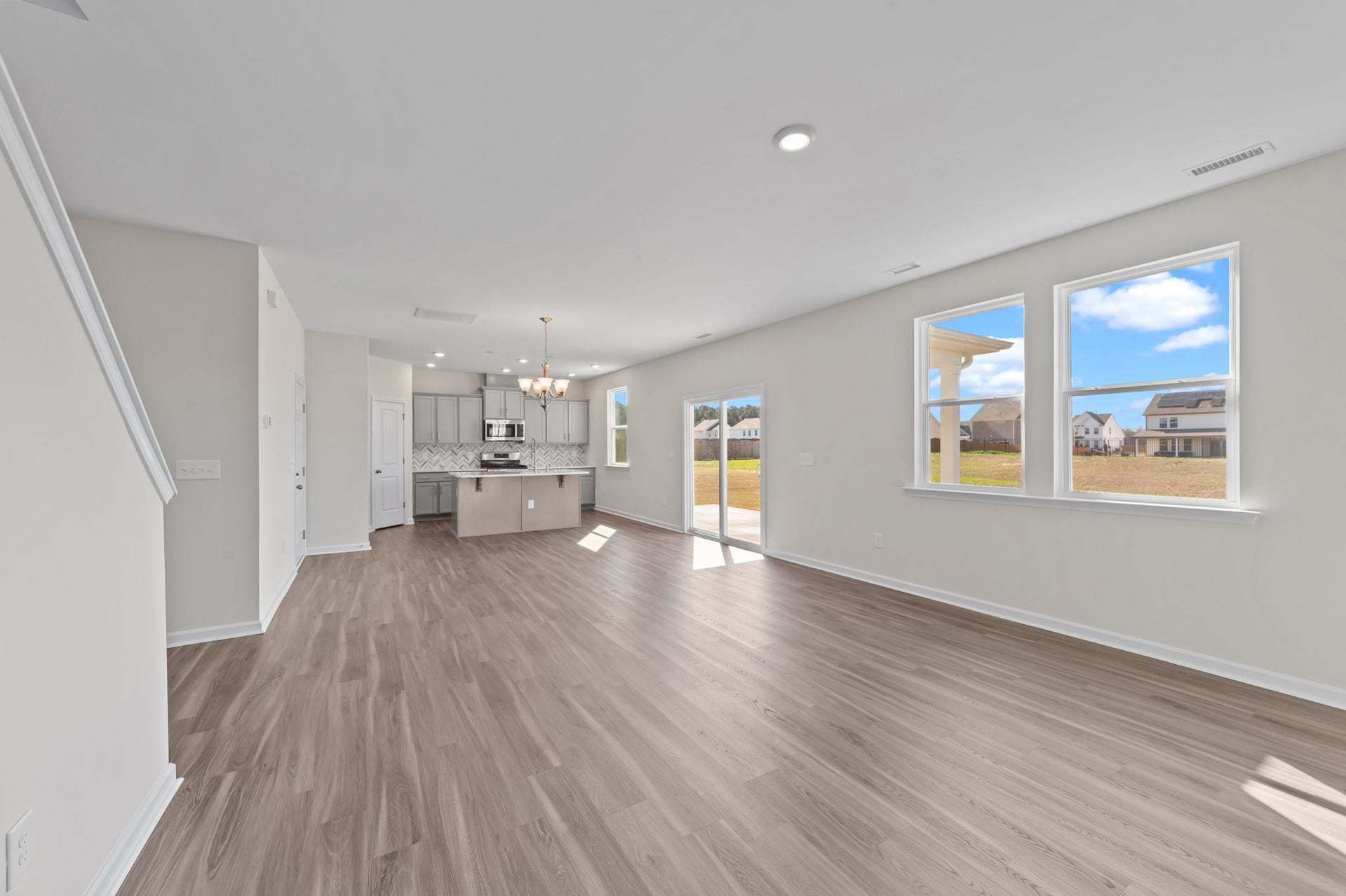 Actual Home - Great Room, Dining Area, & Kitchen