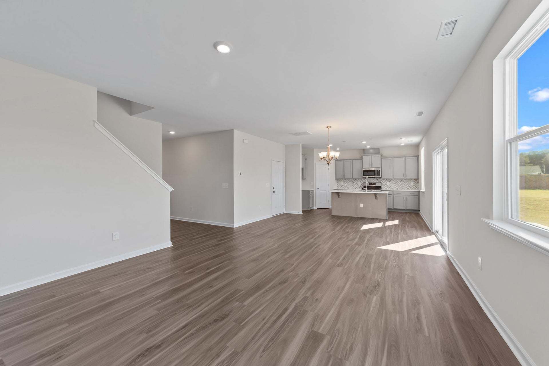 Actual Home - Great Room, Dining Area, & Kitchen