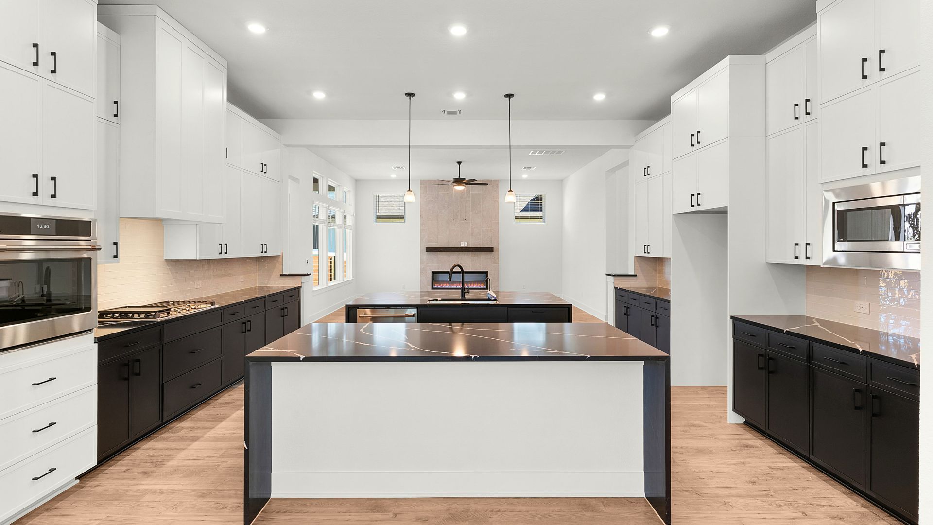TEX-Aiden-D-Broken Oak-2320 Tobiano Trace-Double Island Kitchen.jpg