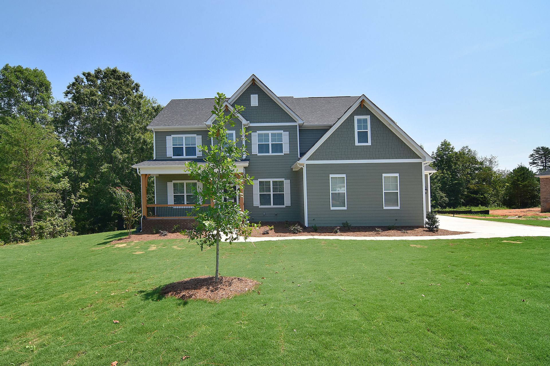 This stately 2-story home features a 19 ft foyer, well-lit study, elegant dining room, and a spacious family room with a fireplace. The large kitchen and casual dining area are perfect for gatherings. Enjoy a morning room, walk-in pantry, and flex space. 