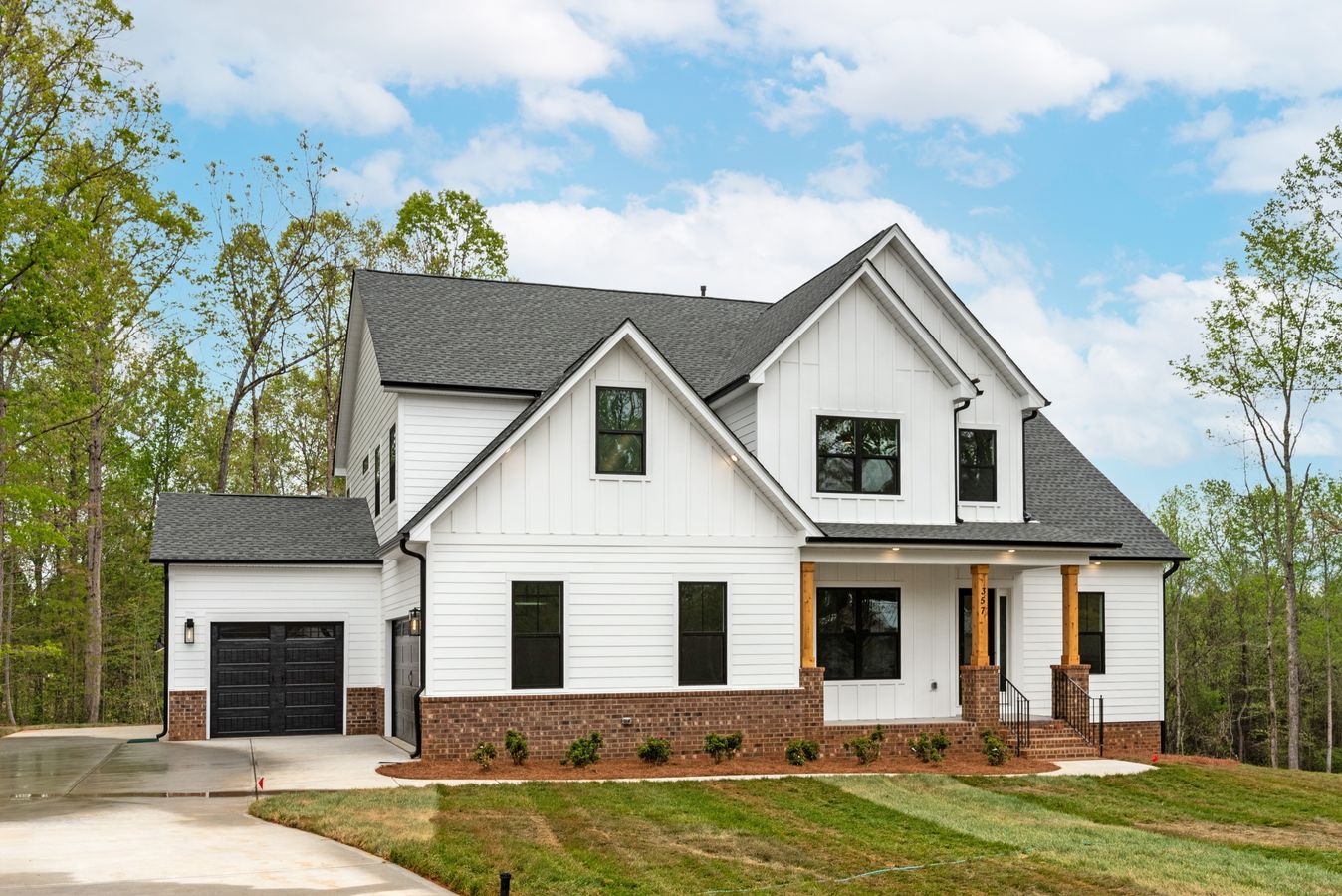 This open first-floor living plan exudes sophisticated charm. The flexible foyer space can be a dining room, music room, or parlor. A well-lit study opens to an extended covered porch, which can be a 4-seasons room. The family room features a choice of fi