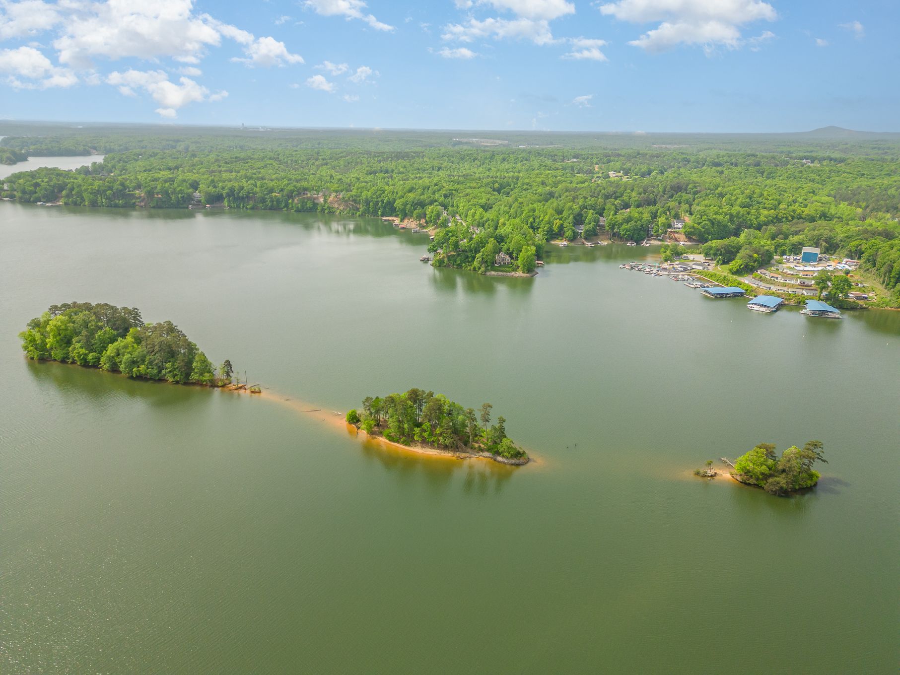 Residents can boat or swim to explore two private islands owned by Harbor Watch. Imagine how fun it would be to kayak on Lake Norman at the Mouth of the Catawba River to your own private island!