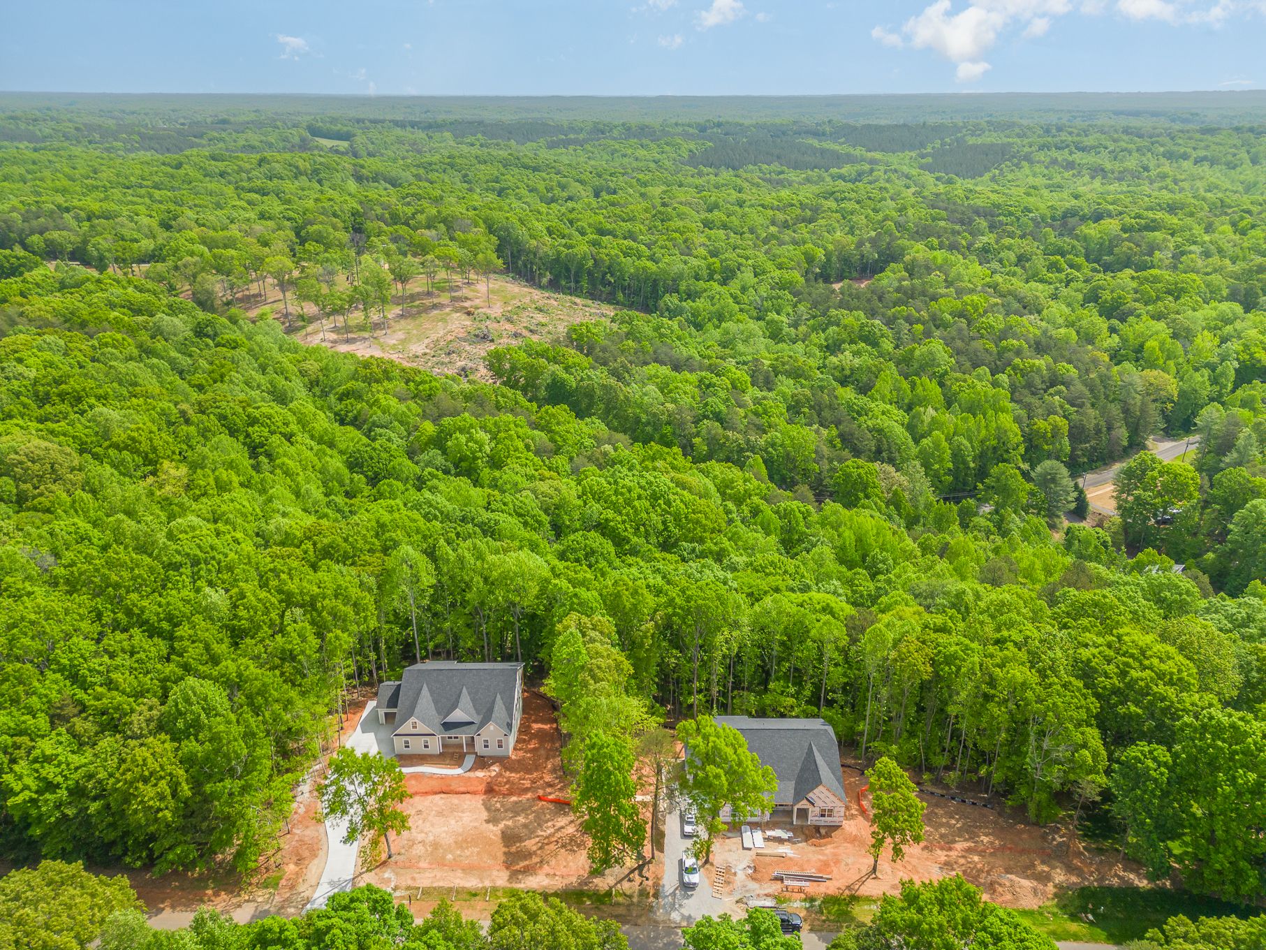 Harbor Watch is a gated community known for seclusion and amenities. Residents enjoy large lots with mature trees, and a lovely walkable neighborhood with hills. It almost feels like a mountain town next to the lake. 