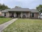casa en Contender Construction and Roofing por Contender Construction and Roofing