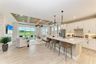casa en Watercolor Place Coach Homes por Medallion Home