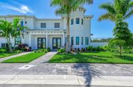 Aqua Townhomes por Medallion Home en Sarasota-Bradenton Florida