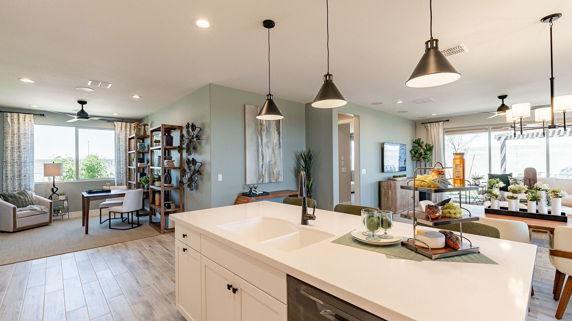 Sienna Park's kitchen offers sleek pendant lighting and an elegant island, perfect for luxury living.