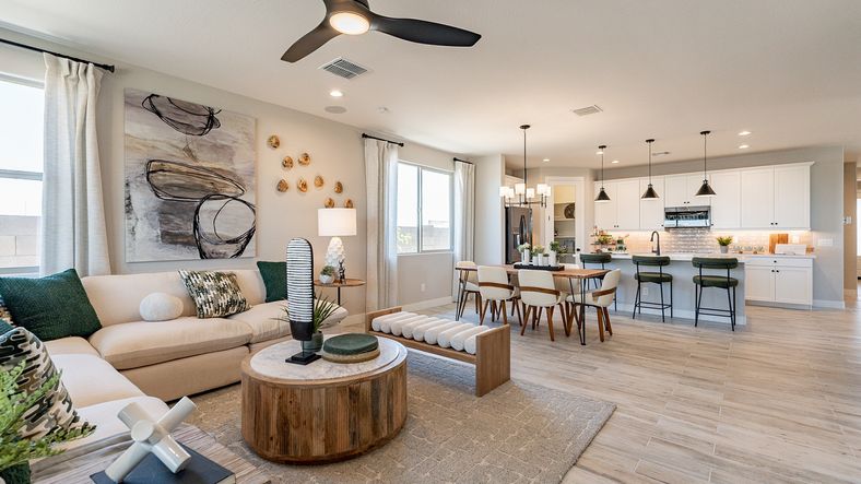 Luxurious open floor plan with elegant finishes, chic décor, and gourmet kitchen in Sienna Park.