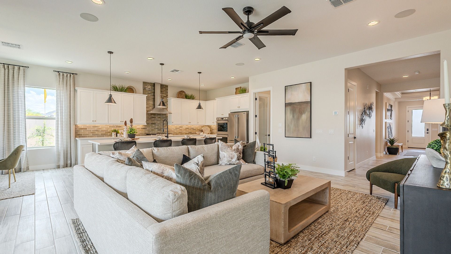 Stylish open-concept design with high-end finishes and expansive windows in Estrella, Arizona.