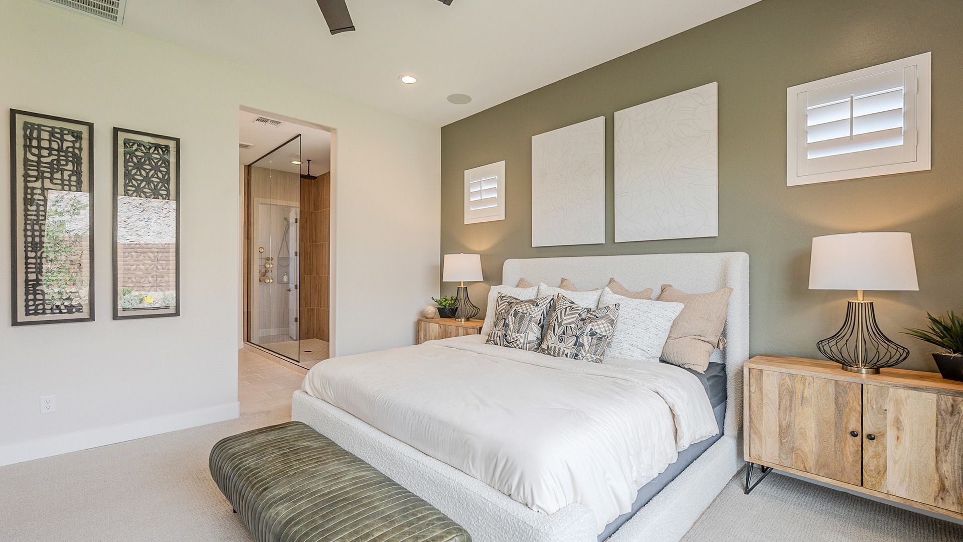 Relax in sophistication with serene tones, elegant wooden accents in Hacienda at Estrella's refined bedroom.