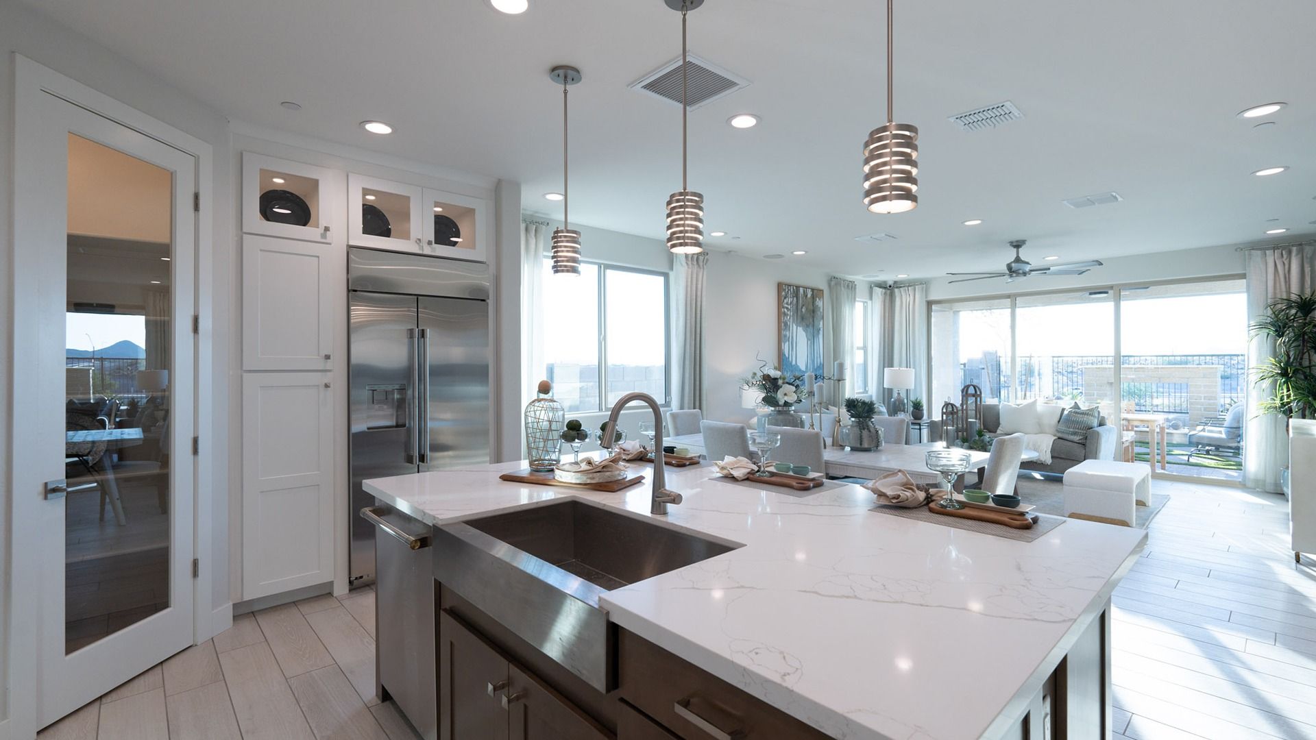 Luxurious marble countertops and expansive windows define elegance at The Villas at Mystic.