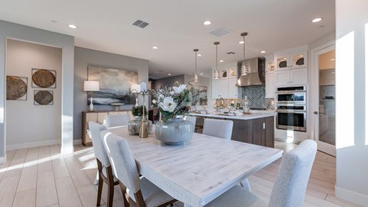 Revel in elegant design with bespoke cabinetry and chic pendant lighting at The Villas at Mystic.