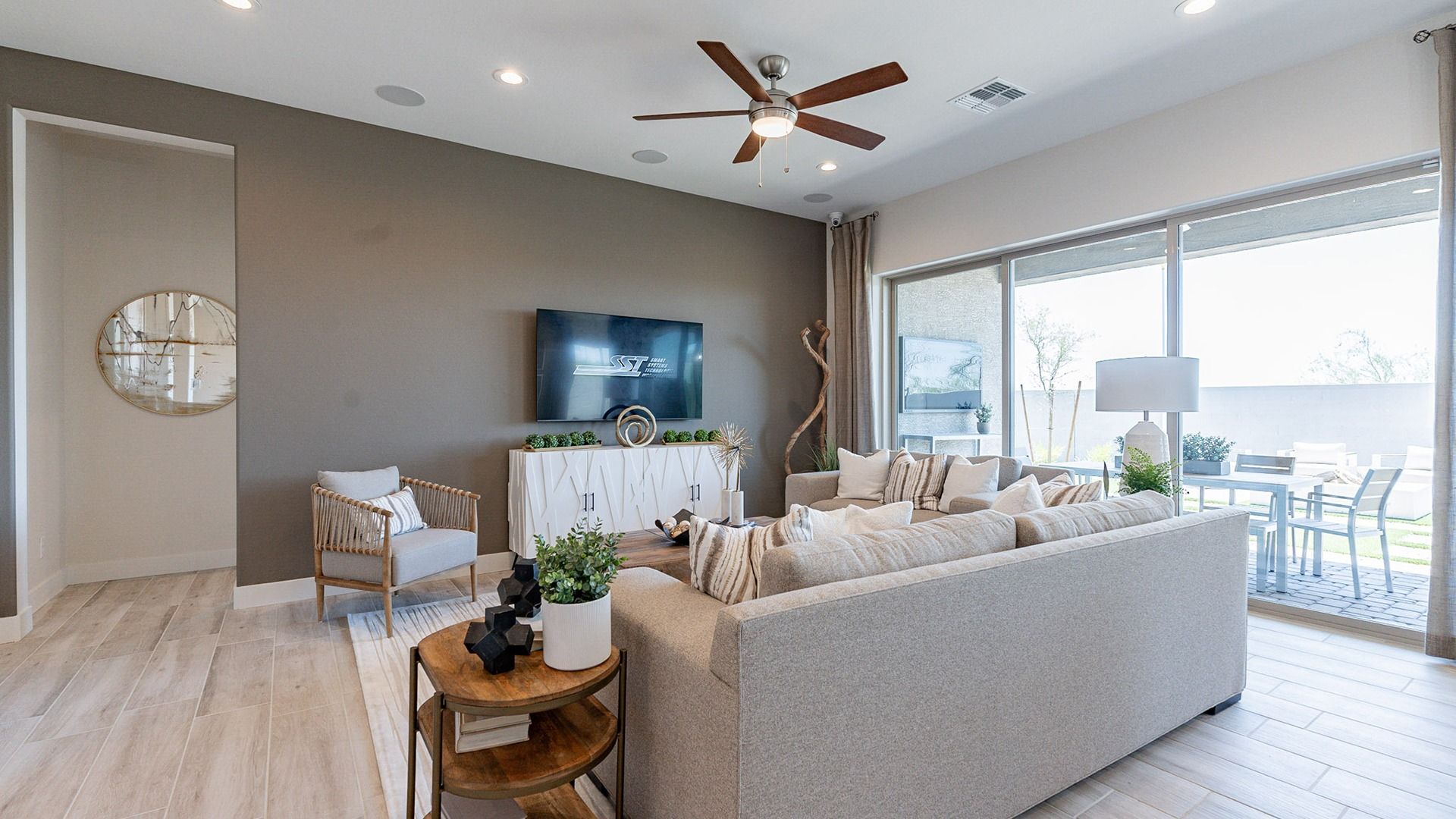 Embrace luxurious living with expansive windows and exquisite wood-look tile floors at Windrose.