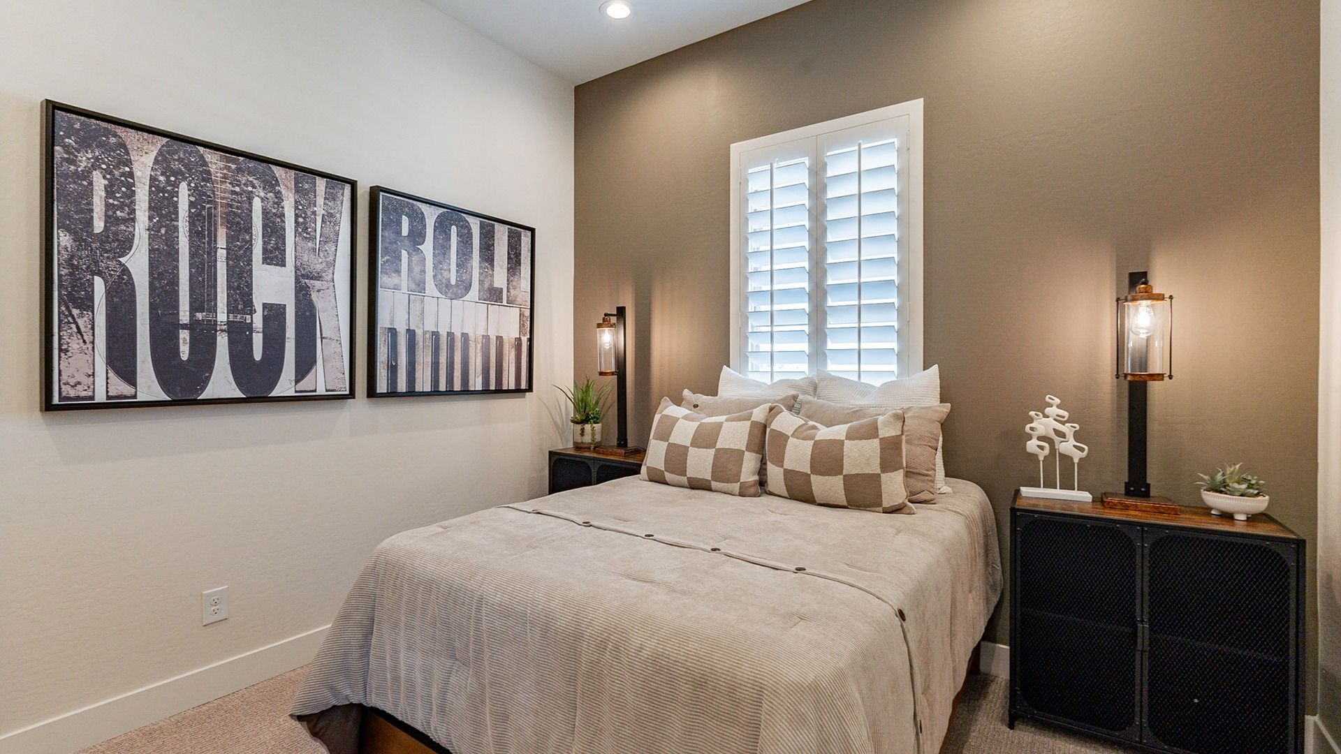 Experience luxury with refined wall art, plush bedding, and sleek lighting in Windrose.