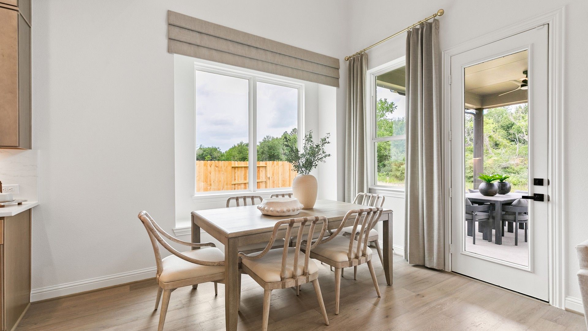 Experience refined dining with expansive windows and exquisite wooden finishes in Katy Lakes community.