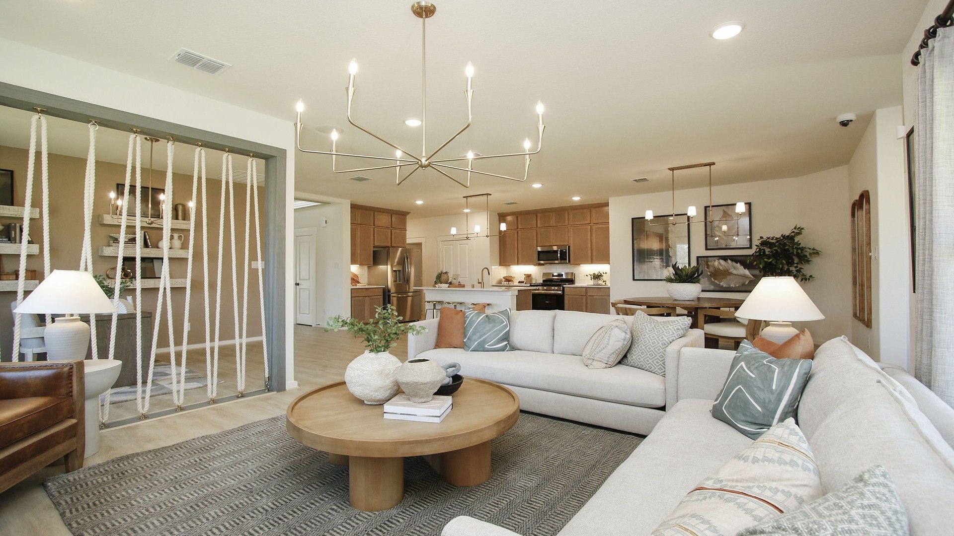 Exquisite design features include chic lighting, open layout, and premium finishes in Cielo community.