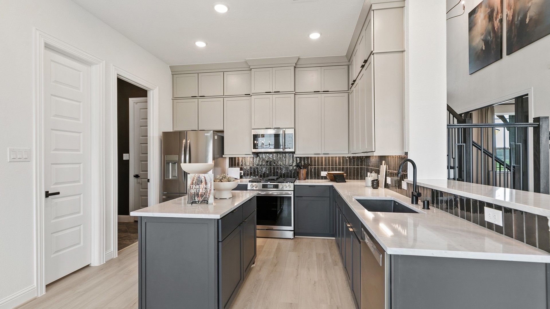 Experience luxury with elegant cabinetry and exquisite marble countertops in Park at Eldridge, Houston.