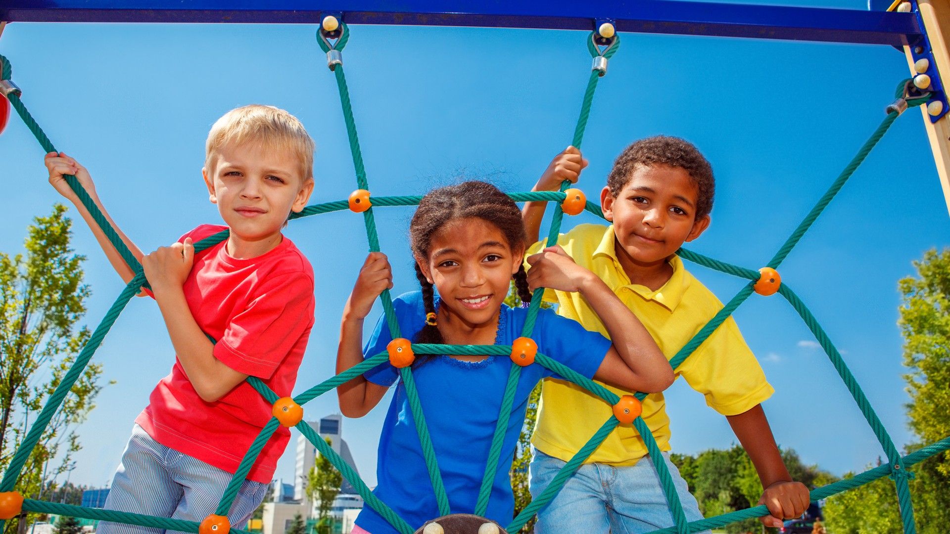 Discover vibrant outdoor living at Bridgeland Central, Cypress with modern climbing structures for all ages.