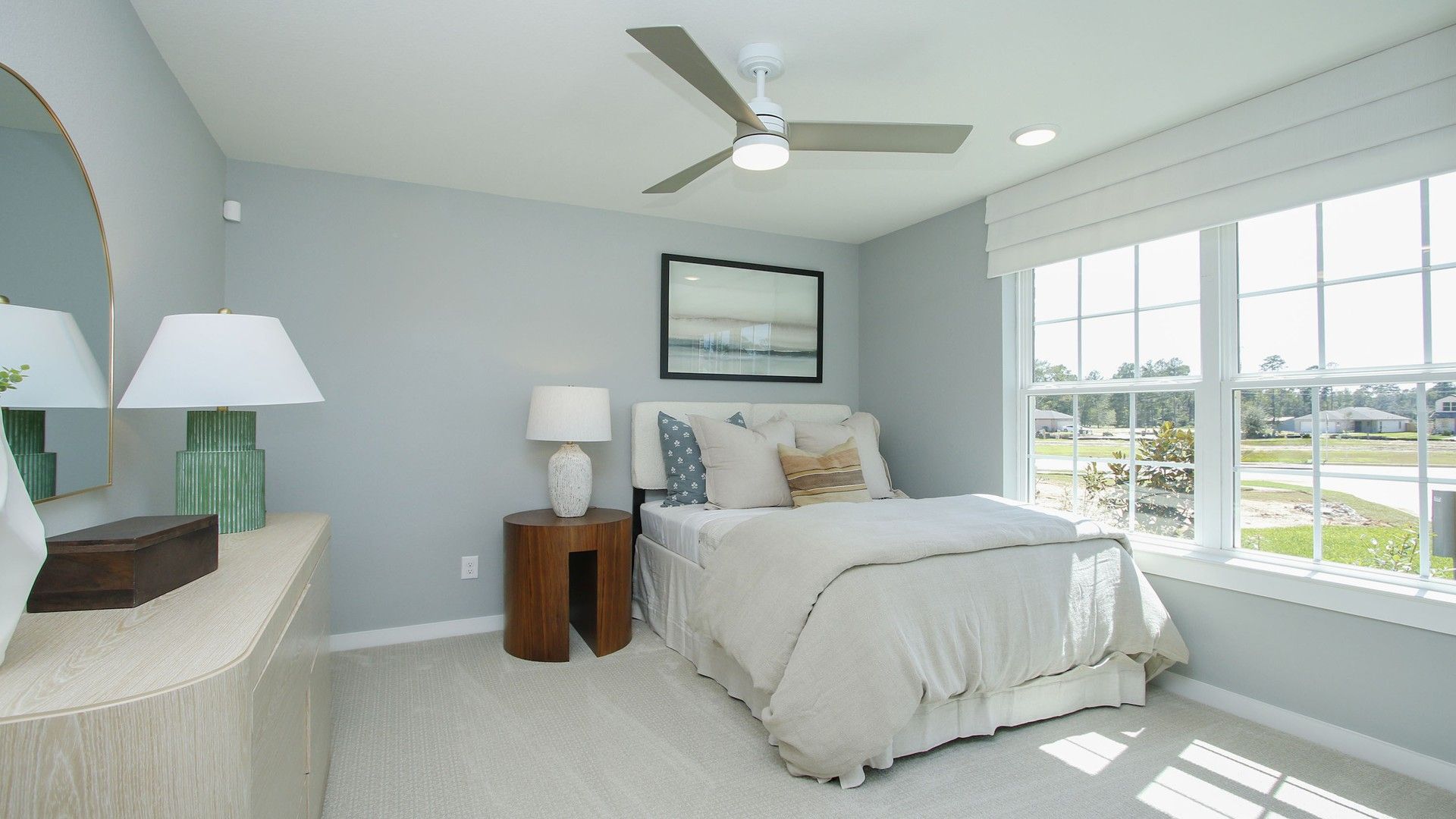 Experience serene elegance with expansive windows and chic décor in Cielo community's luxury home.