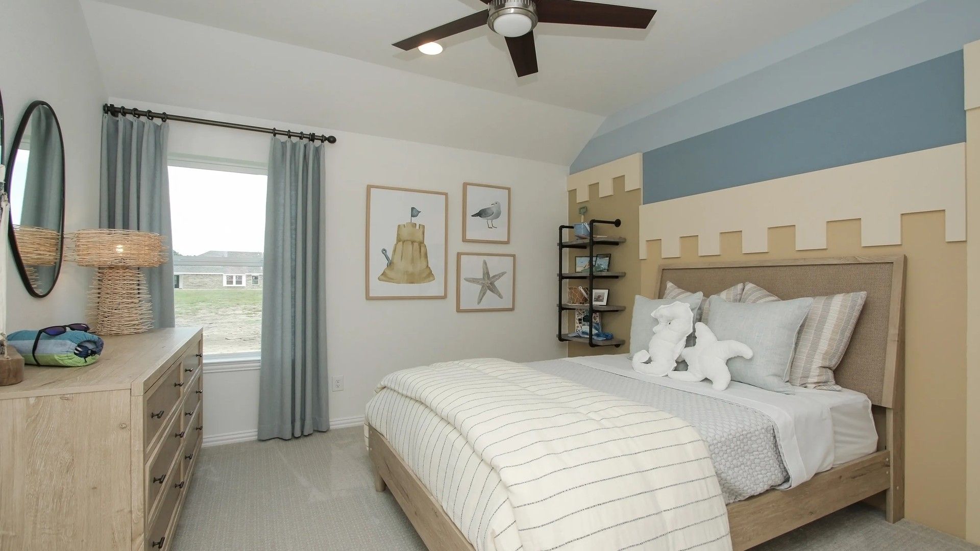 Elegant bedroom in Ellis Cove, featuring a unique castle-themed accent wall and sleek modern fan for luxury ambiance.