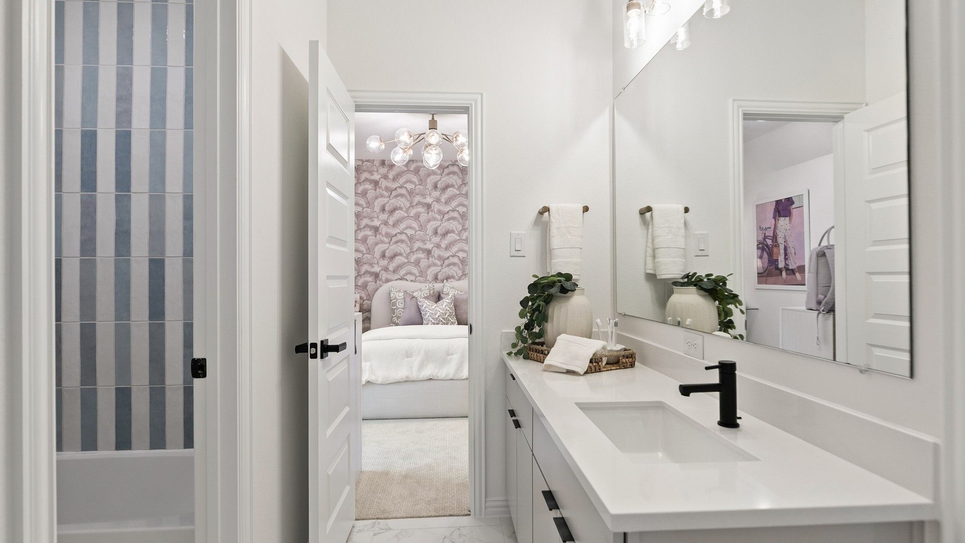 Experience refined luxury with sleek marble flooring and chic black accents in Katy Lakes' contemporary design.