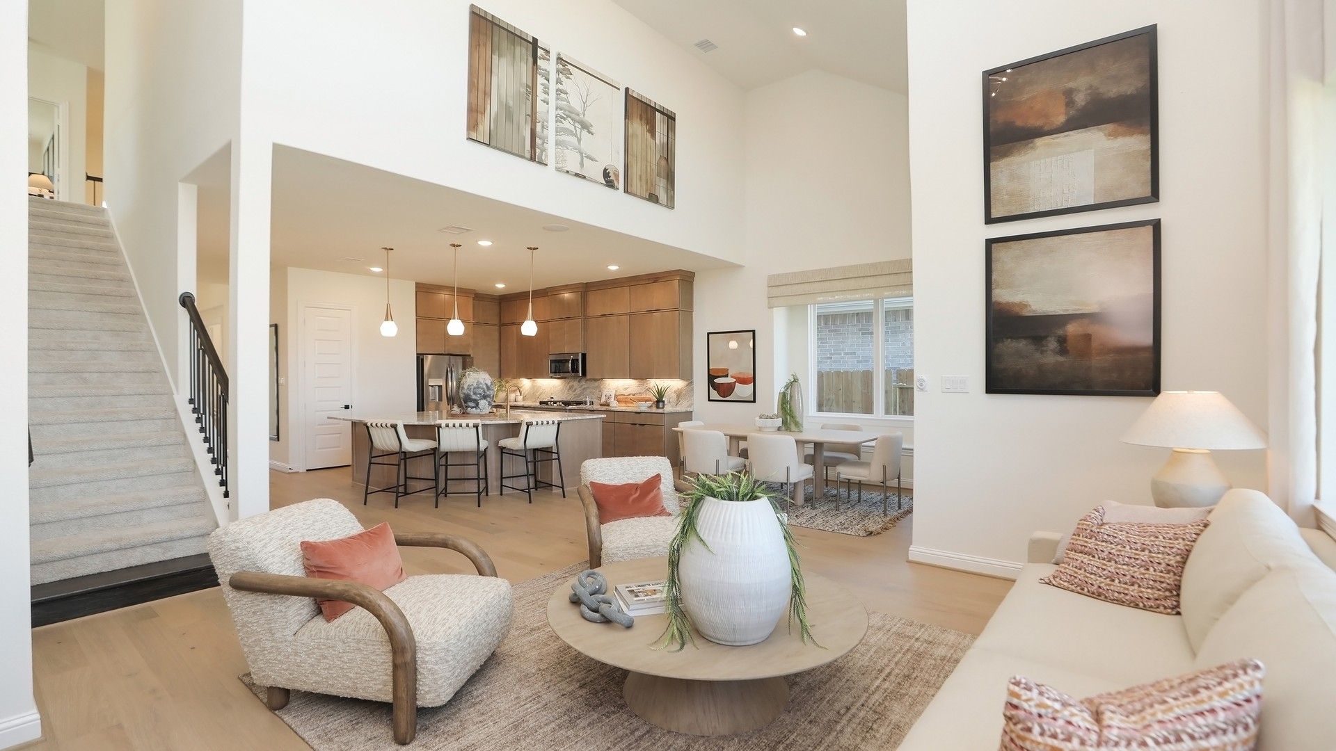 Elegant open-concept design with high ceilings and premium finishes in Brookewater community.