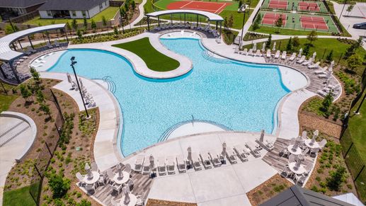 Exquisite resort-style pool with premium loungers and elegant landscaping in Westland Ranch, Texas.