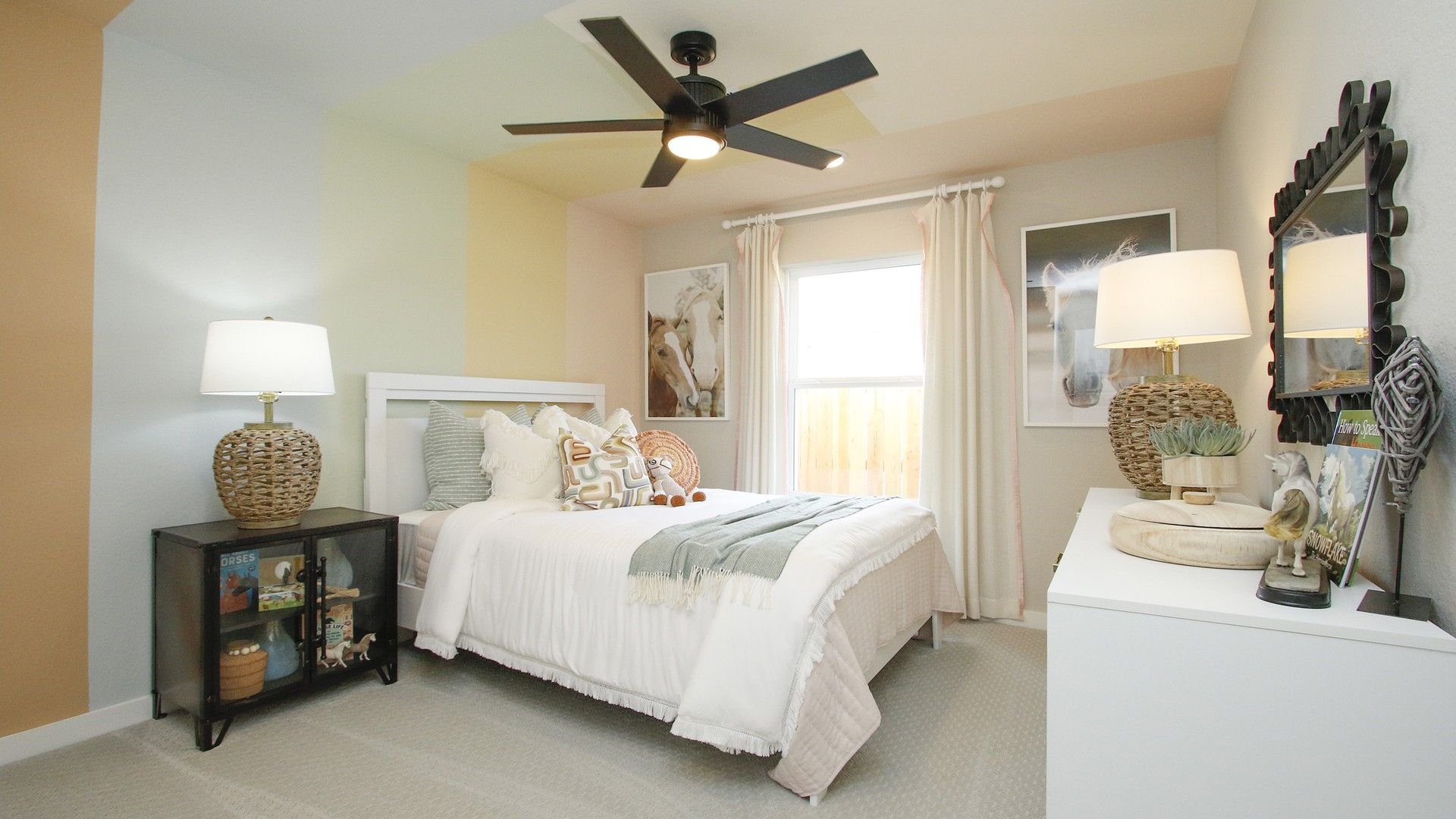 Elegant pale walls and woven lamps add luxury to this Colony at Pinehurst bedroom.