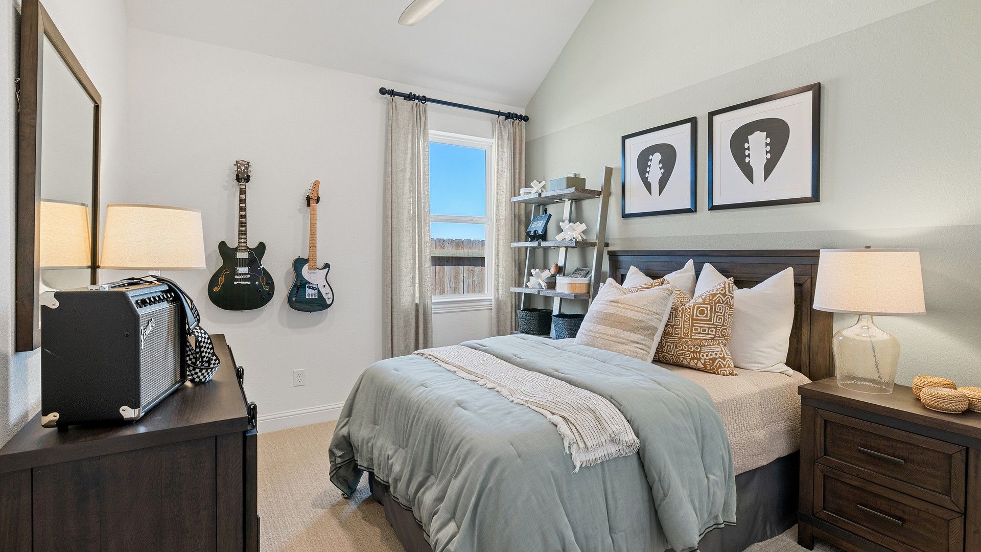 Experience vaulted ceilings and contemporary decor in this luxurious Southern Pointe bedroom.