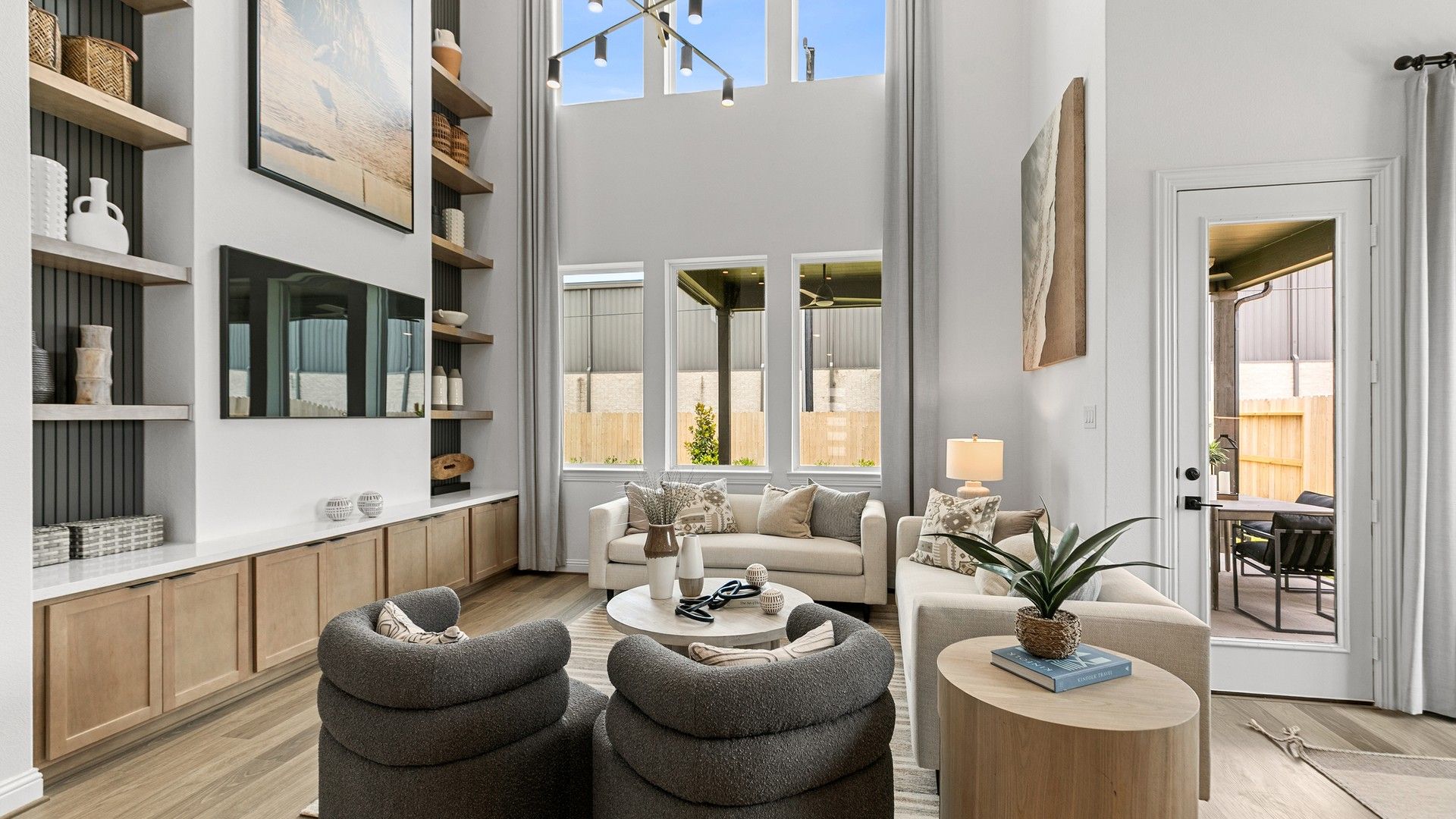 Beamer Villas offers luxurious living with towering ceilings, bespoke cabinetry, and expansive windows for natural light.