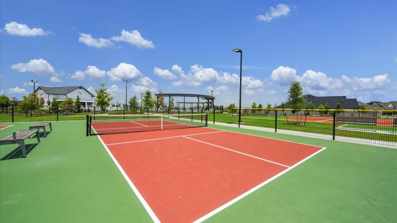 Experience refined leisure at Westland Ranch; modern tennis courts boast premium finishes amid lush surroundings.