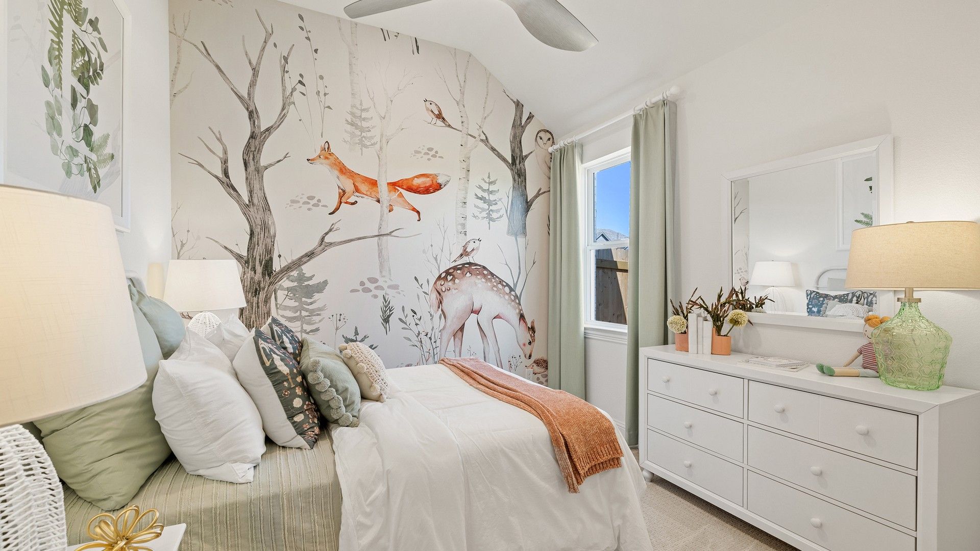 Experience elegant whimsy with a stunning fox mural and chic accents in Southern Pointe.