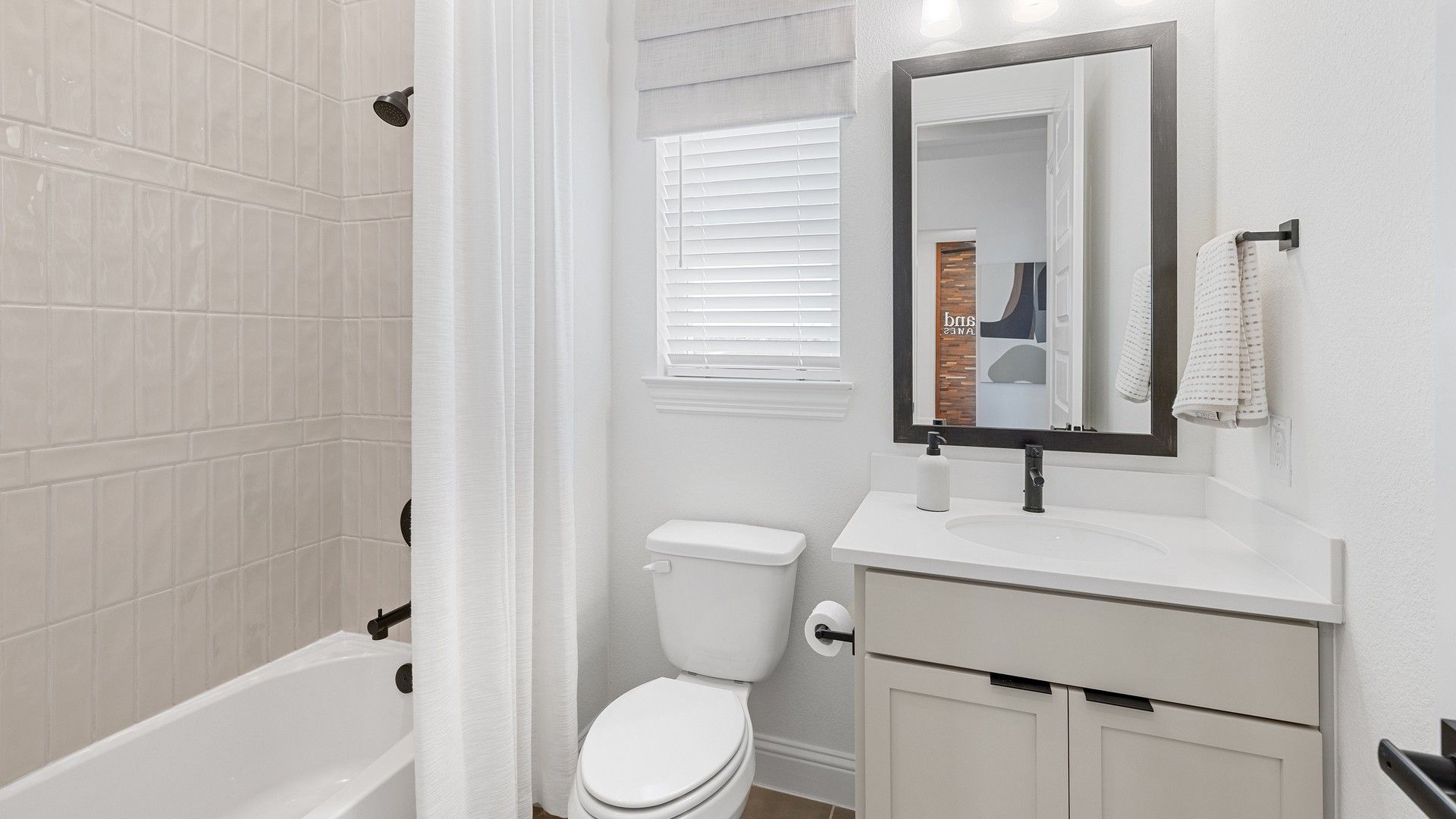 Experience urban elegance at Southern Pointe. Features subway tile, modern fixtures, and sleek vanity.