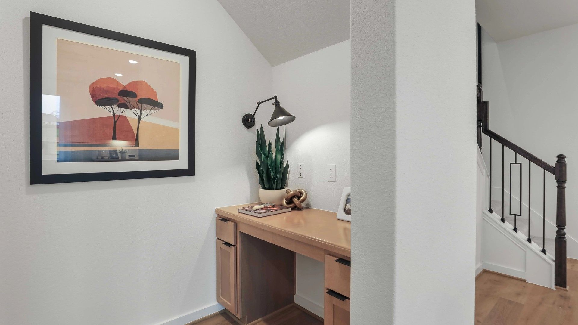 Chic study nook featuring elegant wood and modern accents in Mostyn Springs.