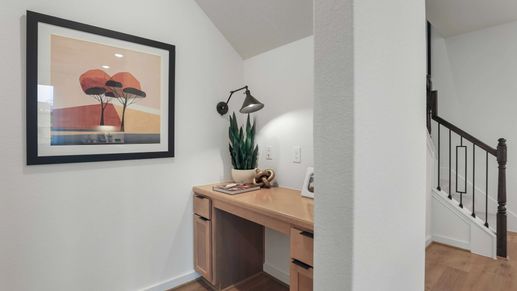 Chic study nook featuring elegant wood and modern accents in Mostyn Springs.