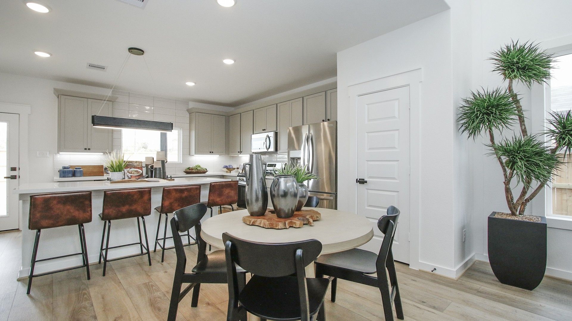 Experience elegance with sleek cabinetry and stainless steel appliances in Pinehurst's Colony.