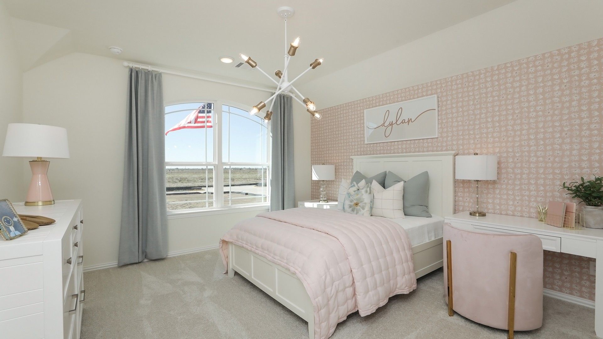 Luxurious Brookewater bedroom with chic pink decor, elegant carpeting, and expansive countryside vistas.