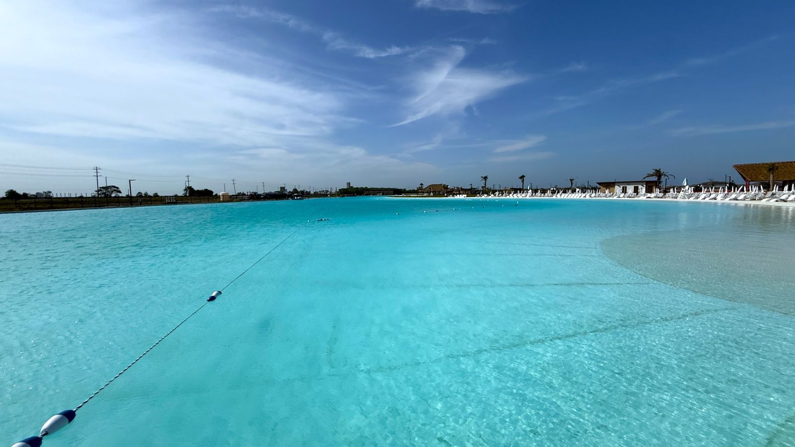 Experience opulent leisure by the pristine turquoise lagoon, complete with elegant loungers in River Ranch.