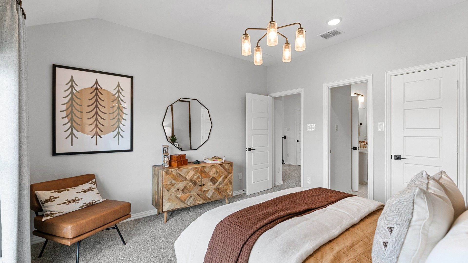 Experience elegance with a geometric mirror, bespoke furniture, and plush textures in Beamer Villas.