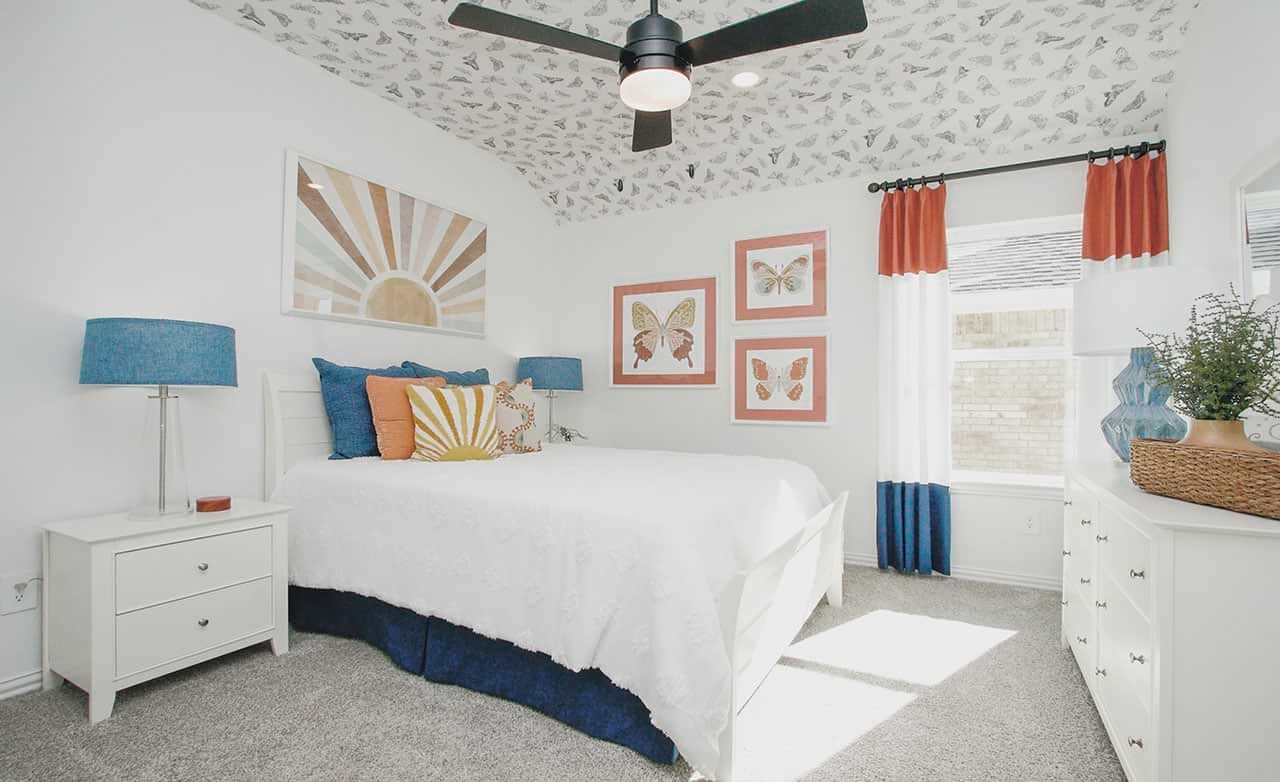 Discover refined elegance with custom butterfly ceiling, sunburst wall art, and vibrant accents in Cypress Green.