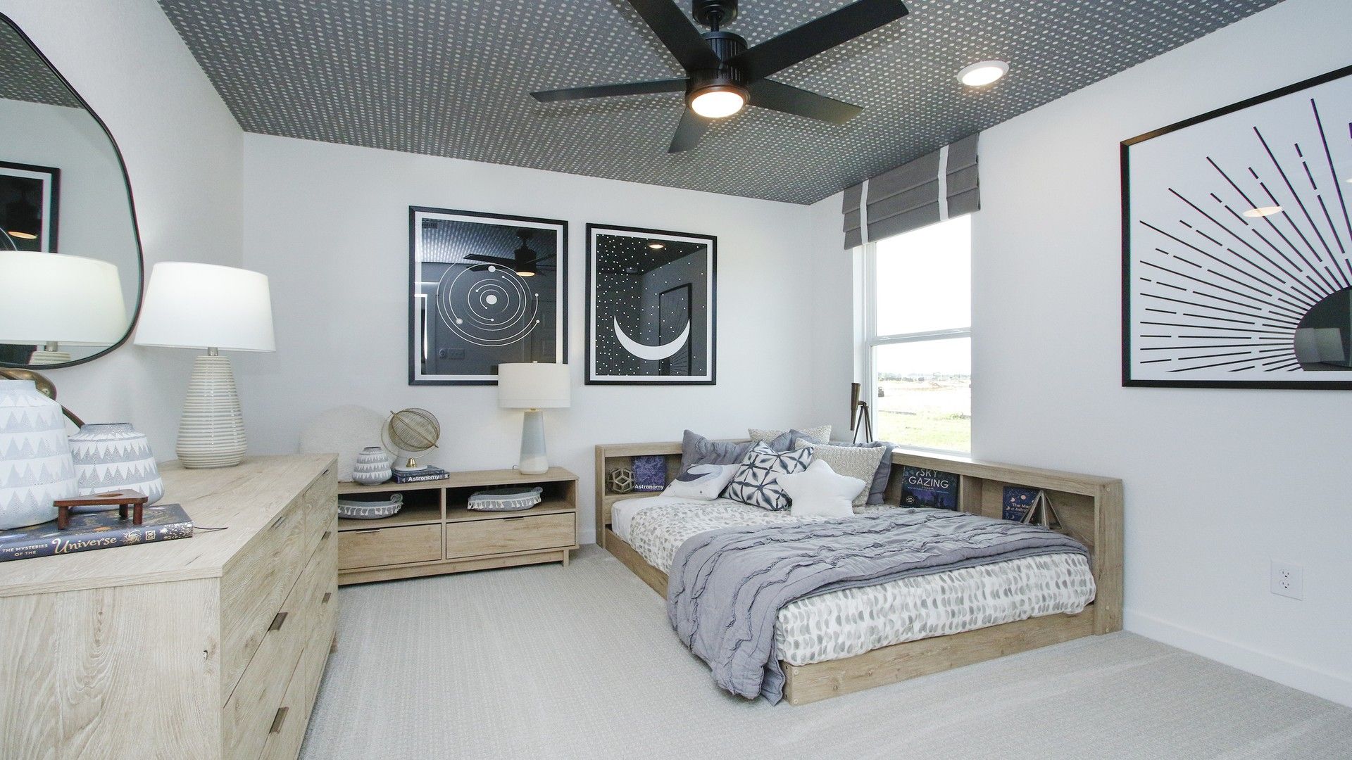 Sophisticated bedroom features chic decor, geometric ceiling, sleek wooden furniture, and expansive window in Pinehurst.
