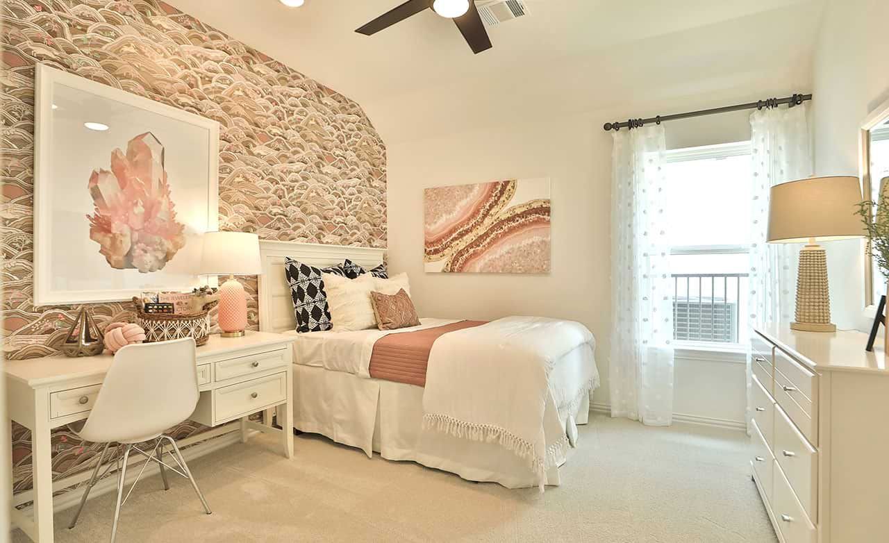 This Bridgeland bedroom boasts textured wallpaper and chic, contemporary furnishings, epitomizing modern elegance.