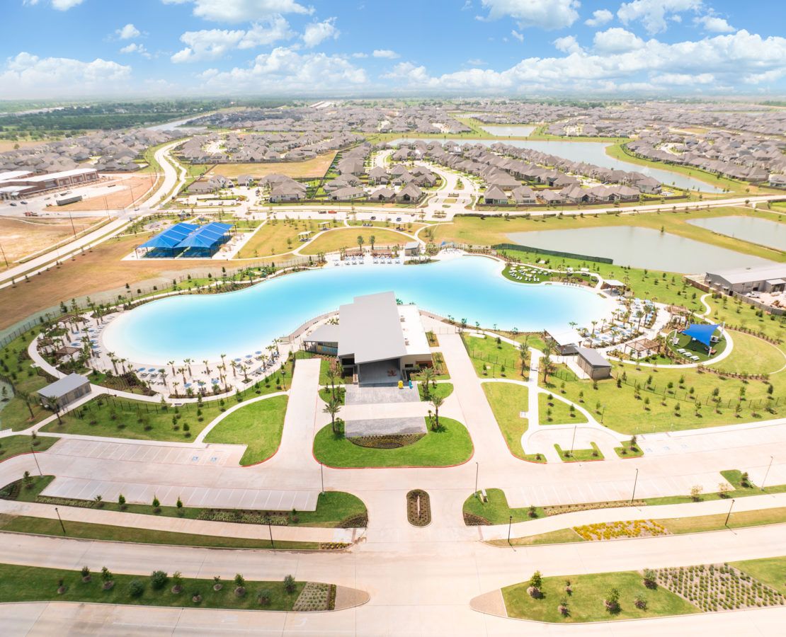 Experience Sunterra's lagoon-side elegance, accentuated by modern architectural refinement in a serene suburban haven.